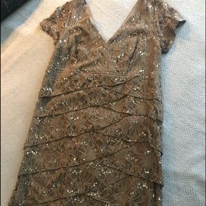 Stunning gray formal dress with give.